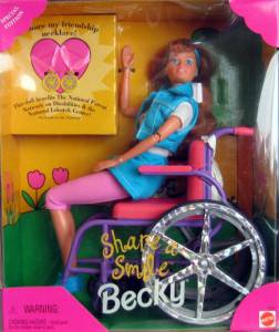 Share a Smile Becky Barbie Doll in pink and purple wheelchair