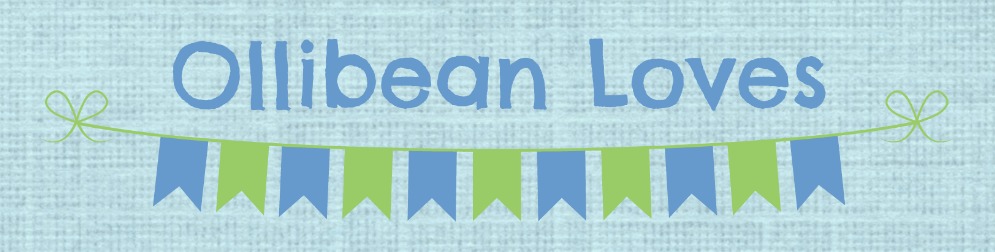 Blue rectangle with "Ollibean Loves" written over blue and green flags