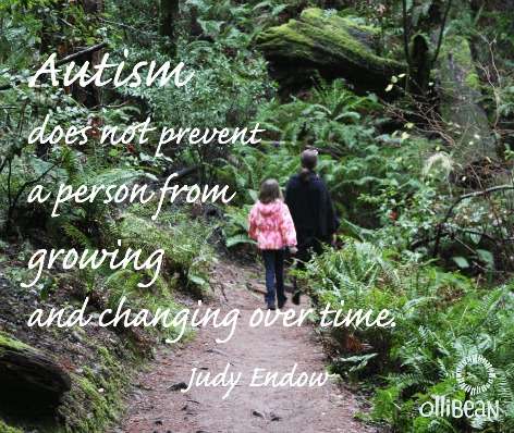 "Autism does not prevent a person from growing and changing over time. Judy Endow" White Ollibean logo. Photograph of the backs of an adult and a child walking on a path through the woods. "Autism does not prevent a person from growing and changing over time. Judy Endow" White Ollibean logo