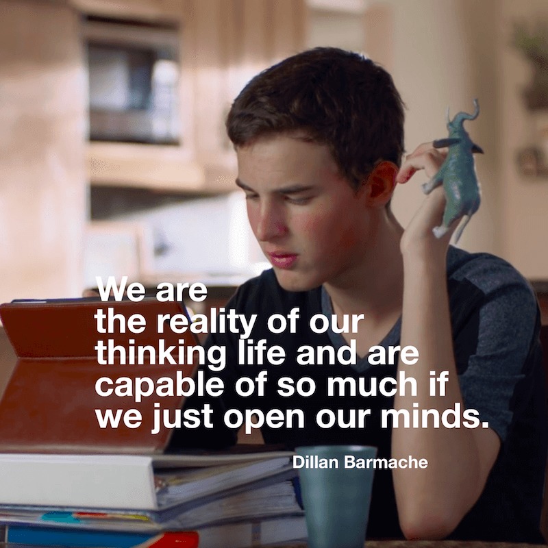 Photograph from Apple video, 'Dillan's Voice'. Teenage boy is typing on iPad. Text reads: We are the reality of our thinking life and are capable of so much if we just open our minds. Dillan Barmache
